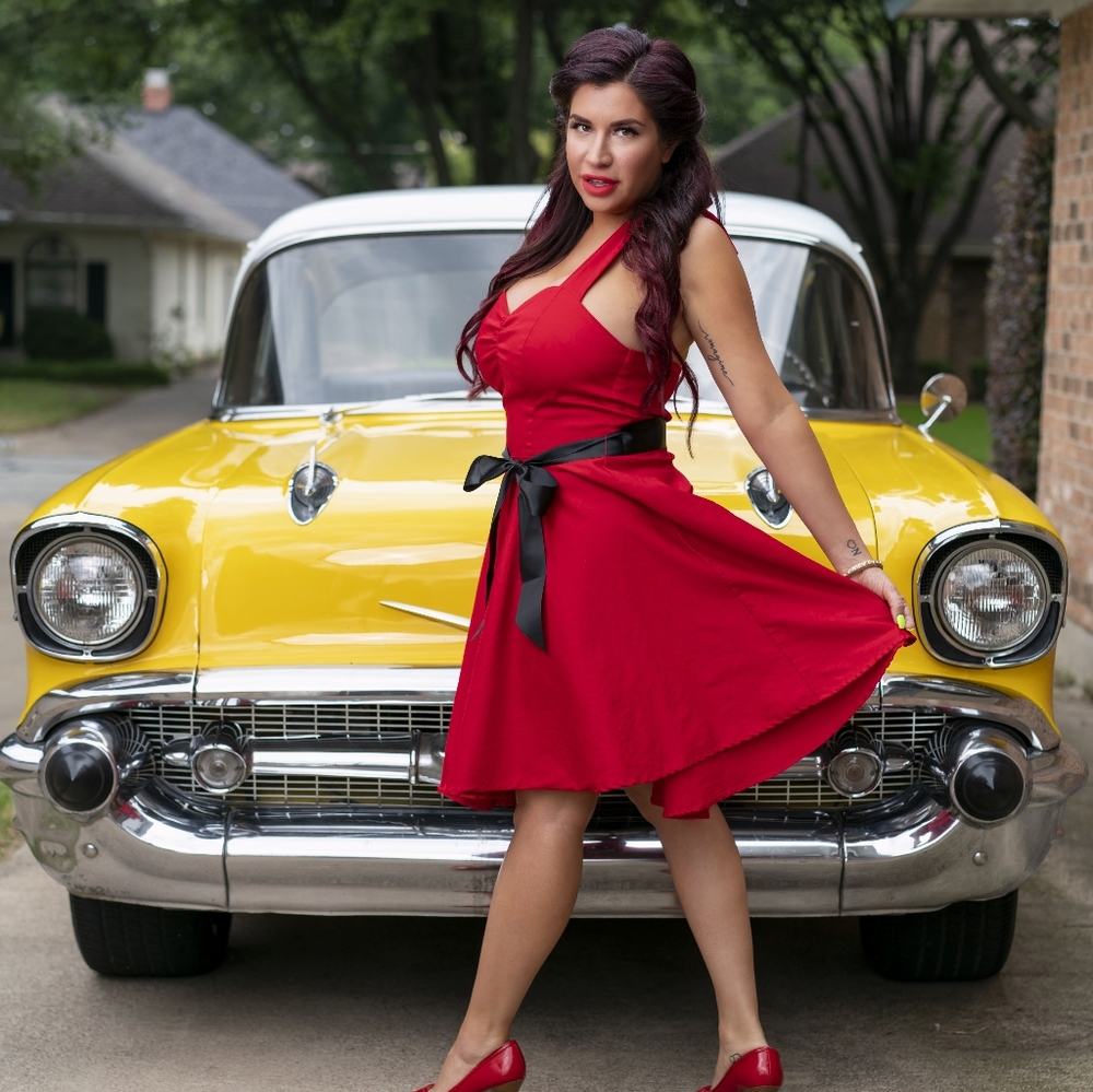 Red 50s style dress with black satin sash